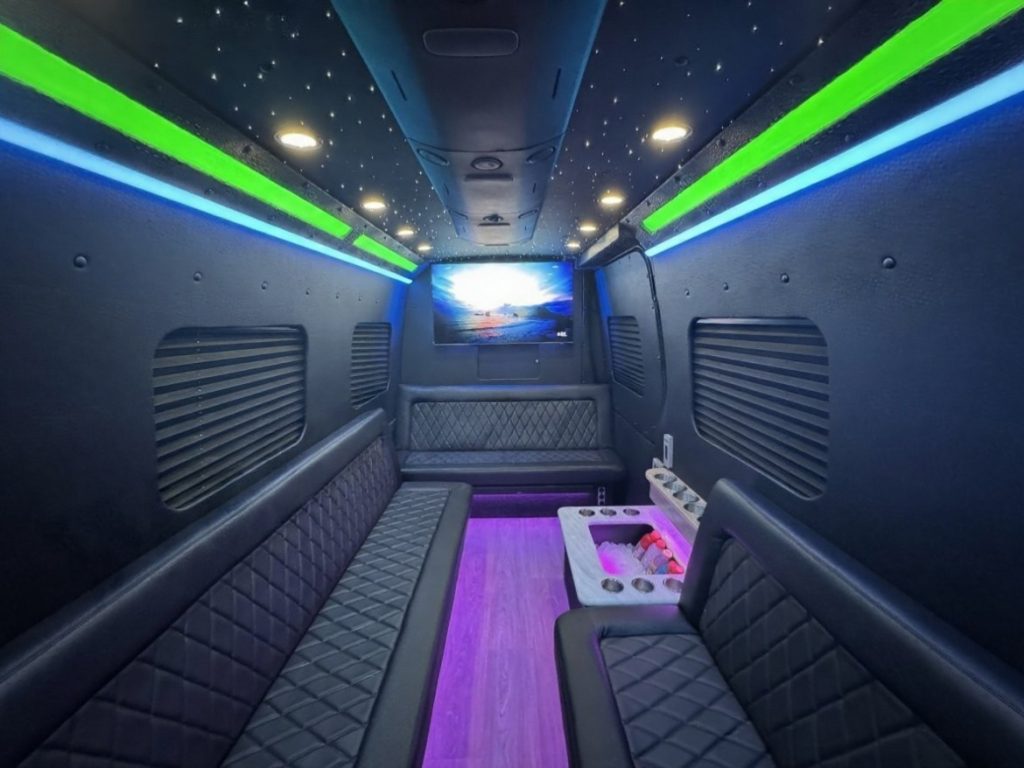 Inside view of plush seating in Westchester 18 passenger party van