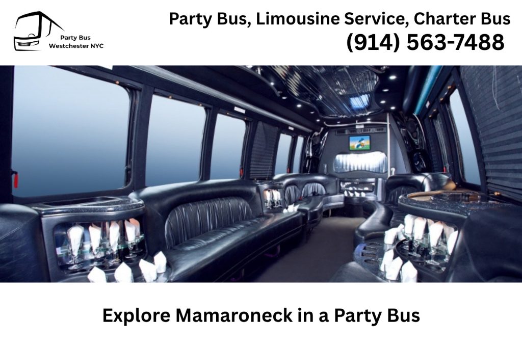 Party bus driving through downtown Mamaroneck NY near shops and the harbor